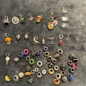 Loose Brighton charms willing to sell single or sell altogether